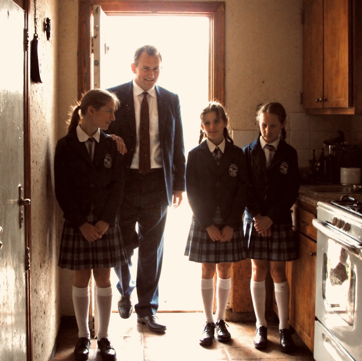 The nurturing grandfather figure sends the children and young adults out into the world